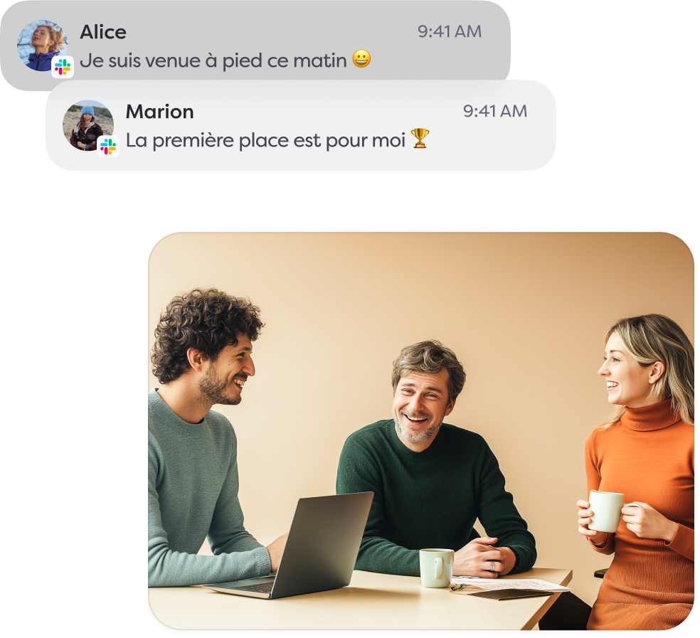 Team chatting around a laptop